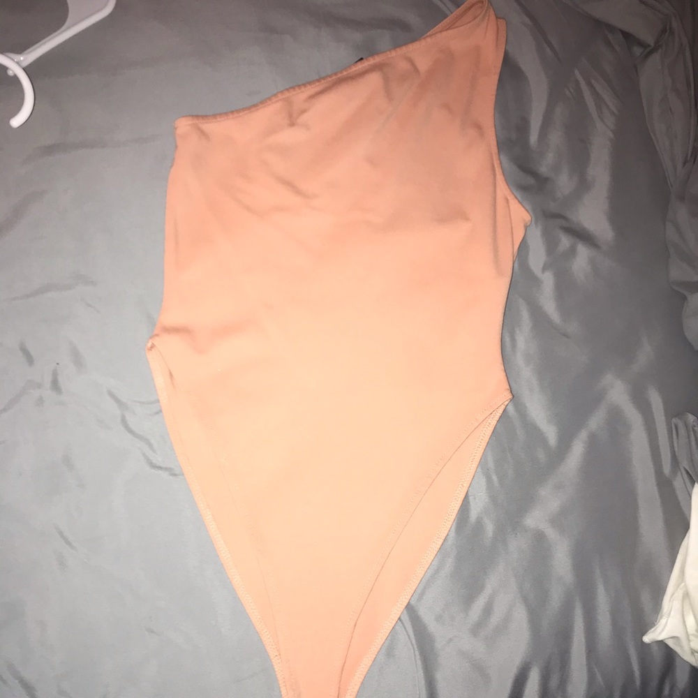 Pink body suit